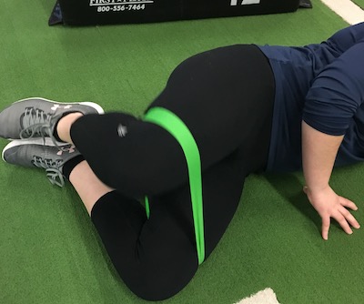 Girl exercising in the gym