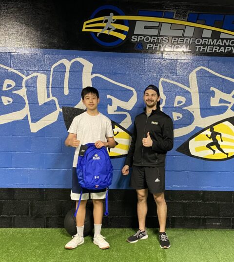 Isaiah Gong getting a backpack