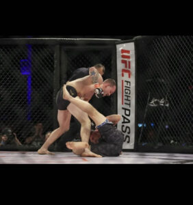 Travis Demko fighting in the ring
