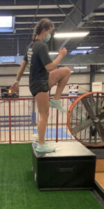 Ally doing jumping jacks