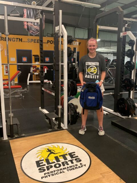 Emma getting a backpack