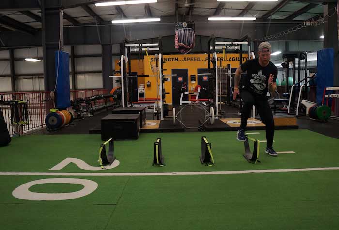Boy exercising in the gym