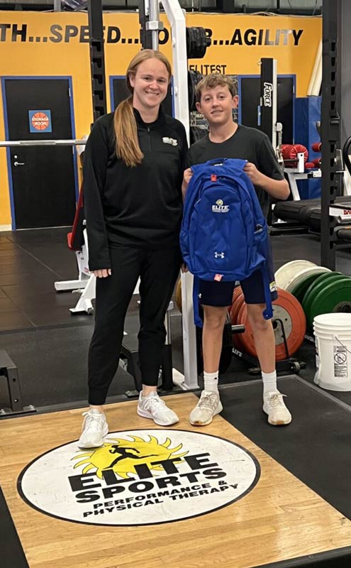 Jack Daly getting backpack