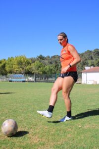 Jenna Katie playing soccer