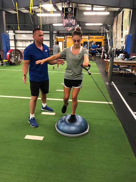 Gabrielle Delpico workout pic with trainer