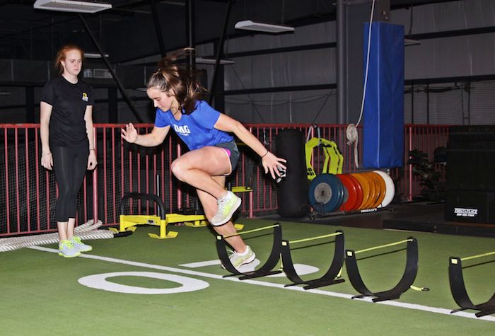 Girl exercising in the gym
