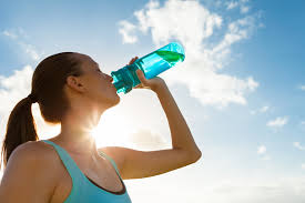 Girl drinking water.