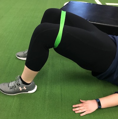Girl exercising in the gym