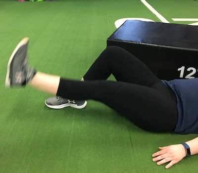 Girl exercising in the gym