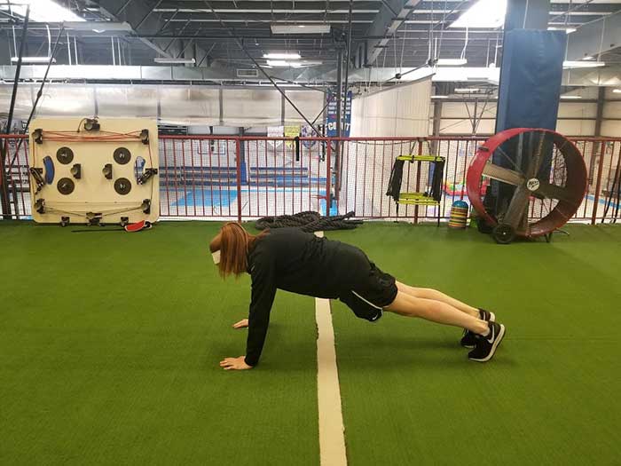 Girl doing Inchworm exercise