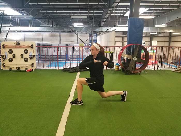 Girl doing Rotational Lunge